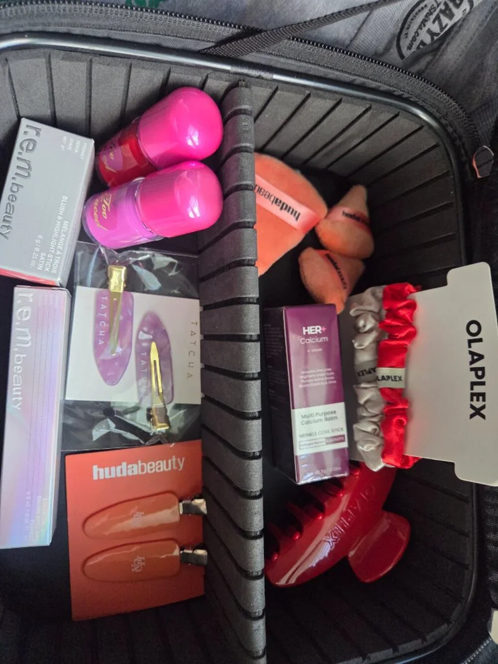 Huda Beauty case, Brigitte Tanaka bag, Too Faced, R.E.M. beauty, Her+